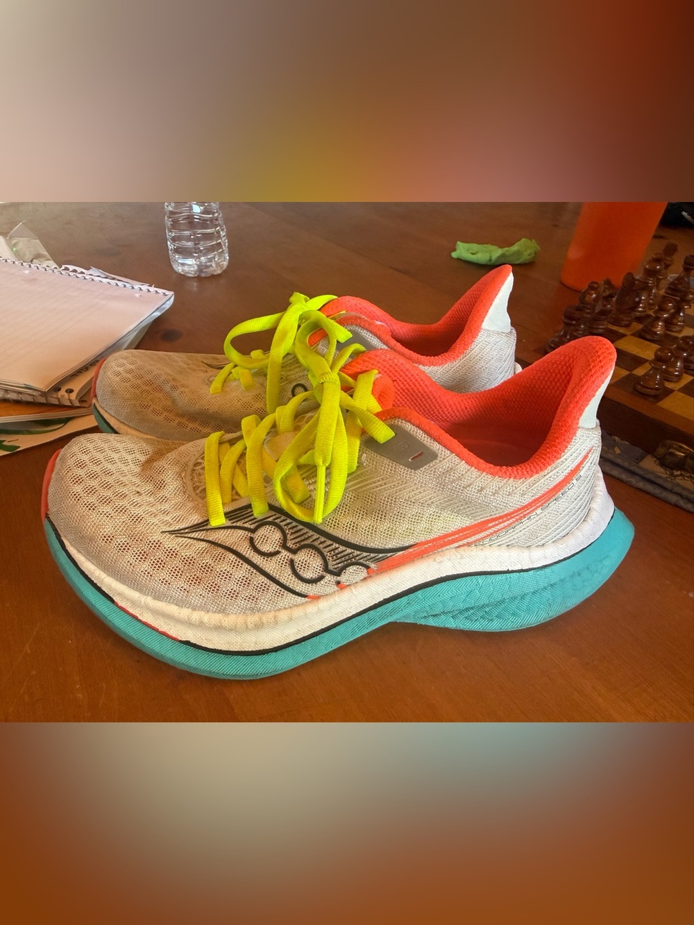 Saucony Women's White Running Shoes with Teal Midsole and Neon Accents